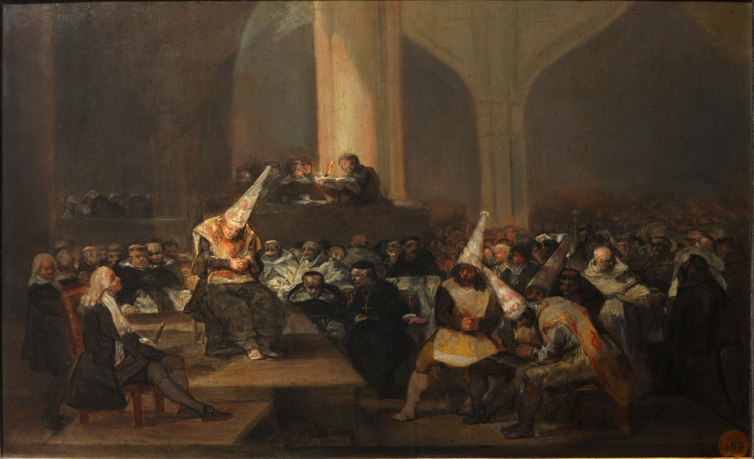 Fotografía del óleo sobre tabla "Auto de fe de la Inquisición" de Francico de Goya. En palabras de Emilio La Parra y María Ángeles Casado (la descripción no es mía, es de gente que entiende): Goya presenta la escena de un autillo. Los condenados a muerte, así identificados por la corona con llamas hacia arriba que portan, escuchan la sentencia, leída por un fraile desde una tribuna o púlpito. La arquitectura de la sala evoca un edificio de siglos anteriores, tal vez la sede de un tribunal inquisitorial. El amplio espacio está ocupado por religiosos de distintas órdenes (se adivinan, sobre todo, los hábitos de franciscanos y dominicos y por un numeroso grupo de personas de las que no se sabe su sexo y condición social, salvo un grupo de mujeres ataviadas con mantilla situadas en un palco. En el centro, un inquisidor vestido de negro, adornado con una cruz, señala a los condenados sin mirarlos, dando a entender su profundo desprecio hacia ellos.