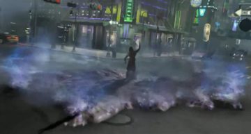 Fotograma de la intro del videojuego Deus Ex Invisible War. En medio de un cruce de calles de una ciudad futurista, iluminada por decenas de rótulos de neón y entre el tráfico, un terrorista levanta el brazo liberando un vial lleno de nanites. Estos nanorobots lo rodean y se expanden por el suelo, en forma de una niebla de plasma iridiscente en tonos azules y violetas. Esta niebla de nanobots es el resultado de la descomposición a nivel molecular de toda la materia con la que entran en contacto los nanites, como un uso malicioso de un constructor universal.