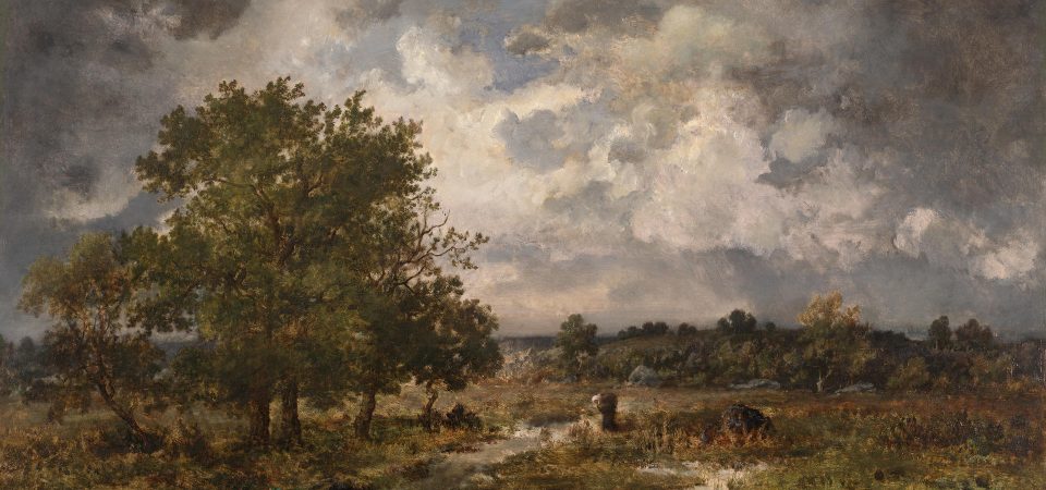 Recorte del óleo "The approaching storm", del francés Díaz de la Peña. Un paisaje que podría ser de las grandes llanuras, con unos cuantos árboles grandes y frondosos, abundantes matorrales de aspecto, muchos de aspecto reseco y, en el cielo, densos nubarrones que se van oscureciendo hacia los bordes. Un escenario poco habitual en Halloween.