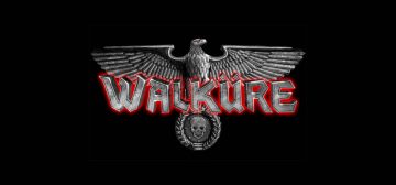 El logo del juego de rol Walküre sobre un fondo completamente negro. Es un áquila de piedra con las alas completamente extendidas, la cabeza girada hacia su izquiera y un ojo rojo, que se posa sobre un círculo hecho de laureles de piedra que rodea la calavera que es el símbolo de los creadores. Por encima aparece el título "Walküre", como si fueran letras de piedra irregular, con un fulgor rojo rodeándolas.